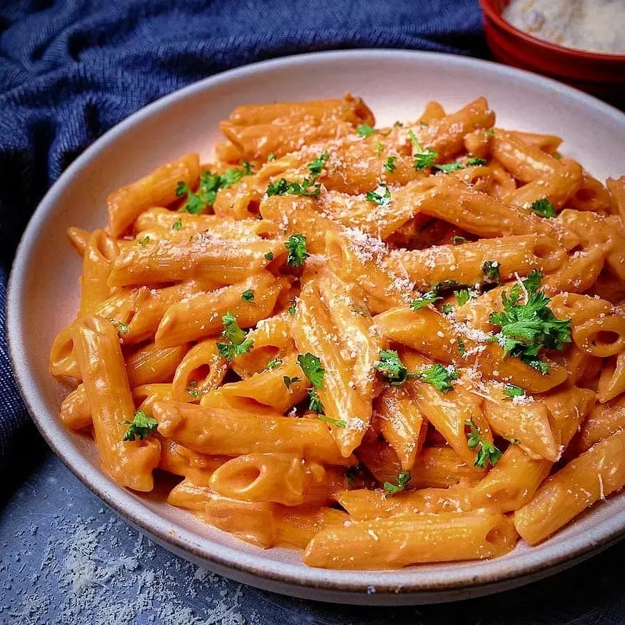 Mix sauce pasta with creamy white sauce and tangy red sauce